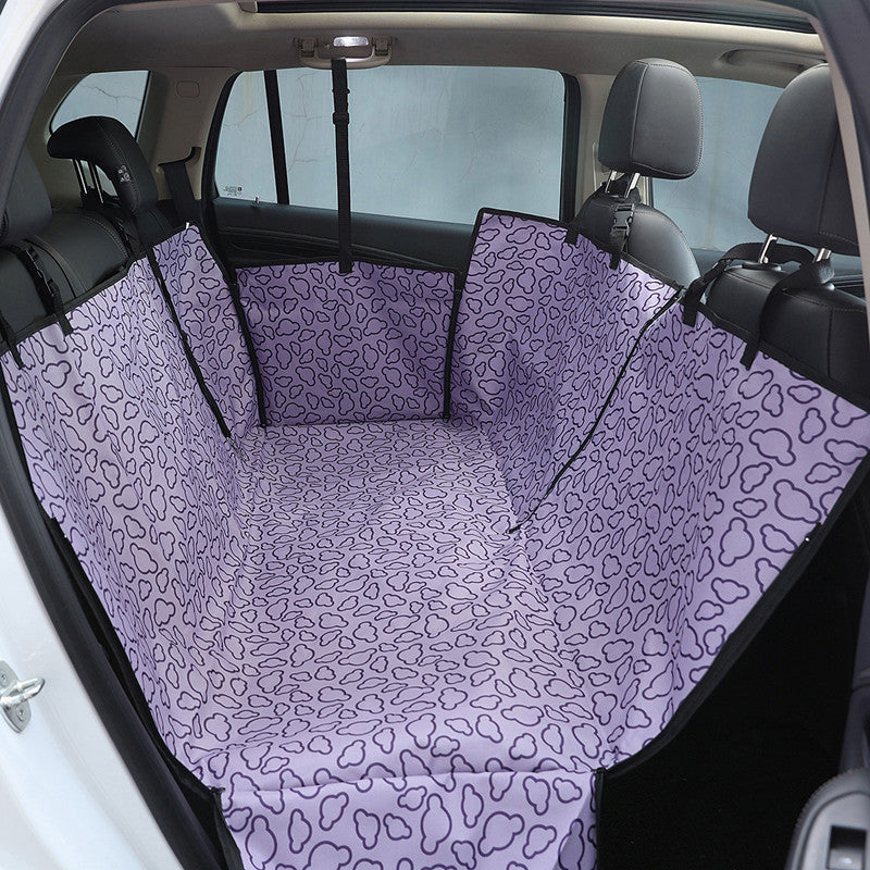 Blue waterproof rear-seat dog hammock installed in a car