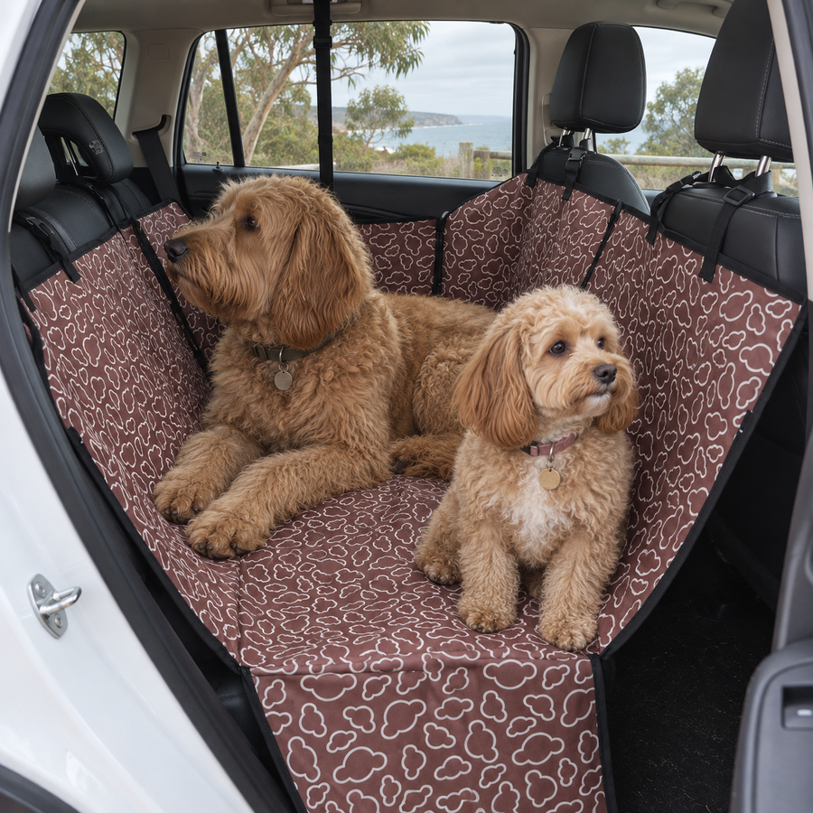 Groodle and Cavoodle using the brown waterproof rear-seat hammock cover